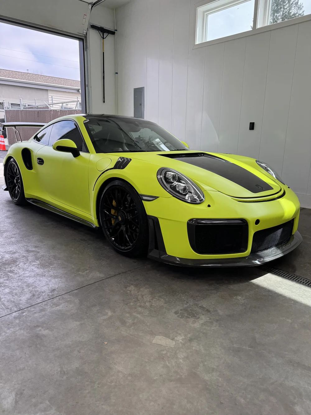 Lime green Porsche 911 GT2 RS detailed at Top Secret Auto Detailing